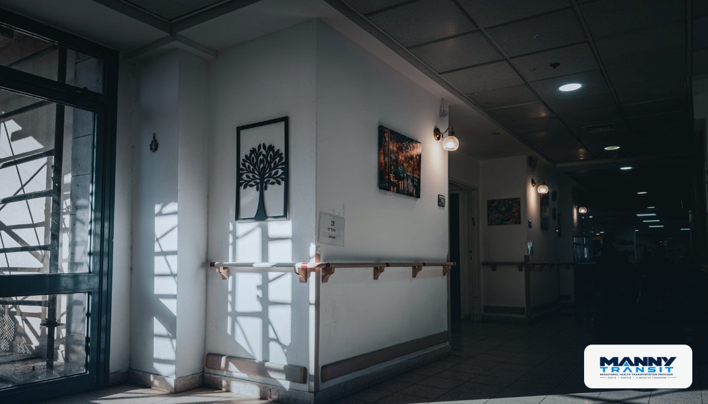 Calm, sunlit corridor inside a psychiatric hospital